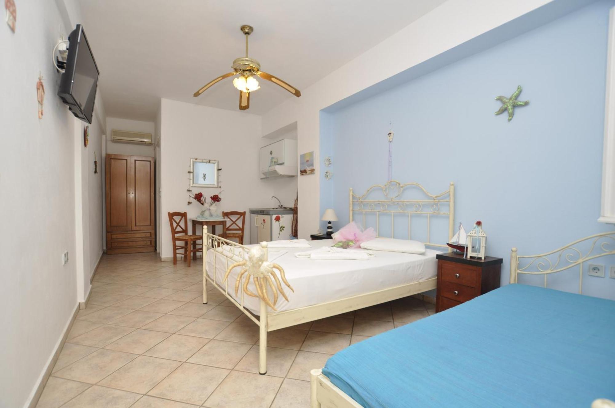 Manos Apartments Mégas Yialós-Nítes Szoba fotó